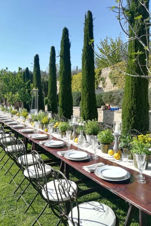 Dreamy garden style wedding reception with potted herbs and lemons in Tuscany