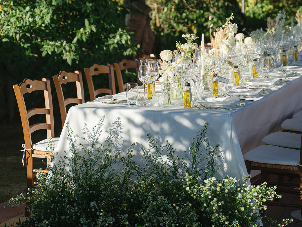 Modern whimsical wedding tablescape in Tuscany