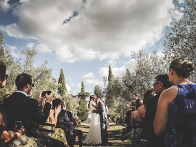 Romantic wedding ceremony in olive grove at Cortona Wedding Hamlet